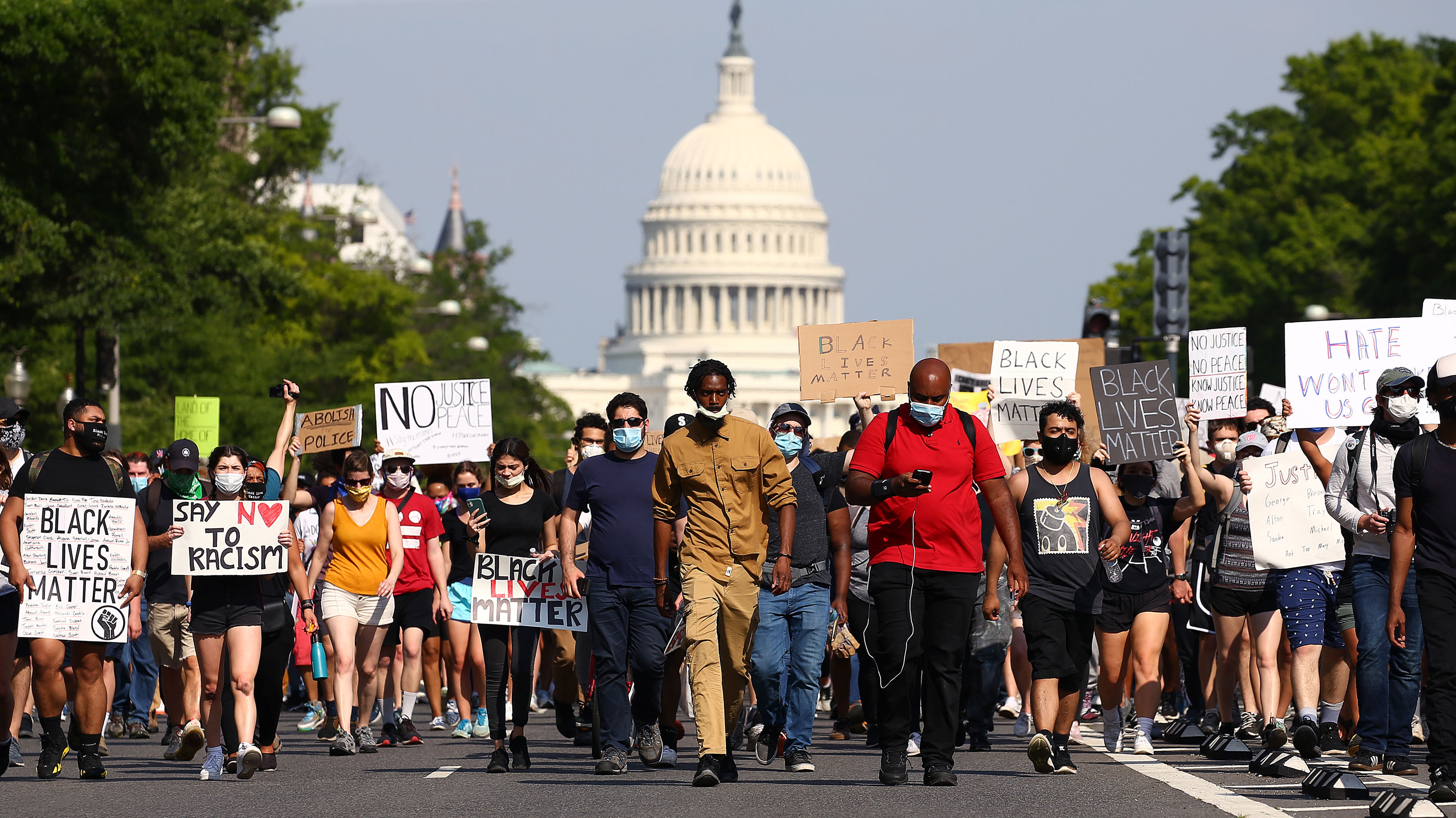 Large group of Black Lives Matter protestors marching in Washington, DC